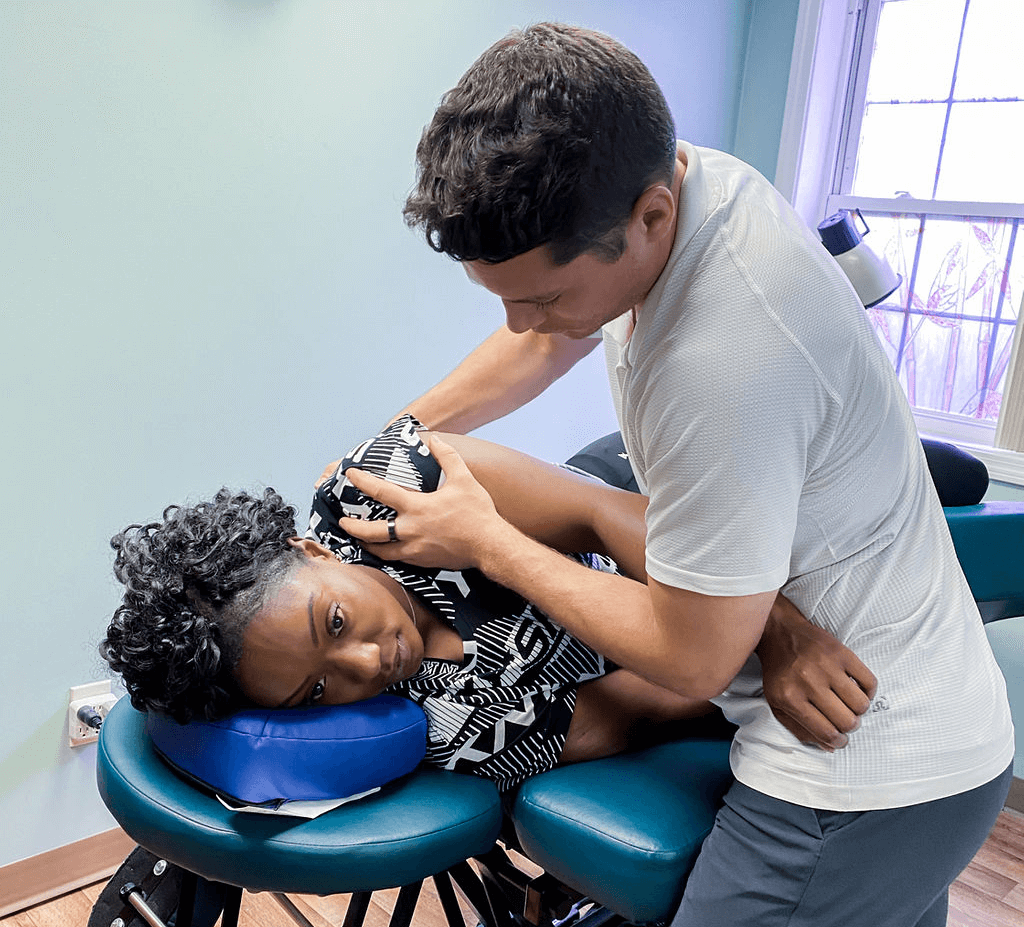 Dr. Ray Zolman doing physical therapy